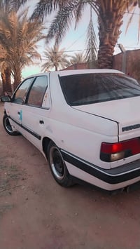 بيجو 405 ٢٠٠٩ • سنويه ٢٠٢٧ • زنون