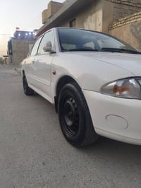 بروتون مكفولة رقم بغداد الماني موديل 2002 سنوية نهاية 2026 تنفذ  كير ع...