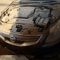 نيسان التيما(2012/2013/2014) لون احمر 13/14 لون فيلي 12 كصة (بجم كبس/ا...