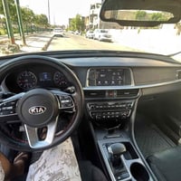 اوبتيما موديل ٢٠١٩ رقم بغداد  سياره وارد امريكي ضرر مثل ما موضح بالسون...