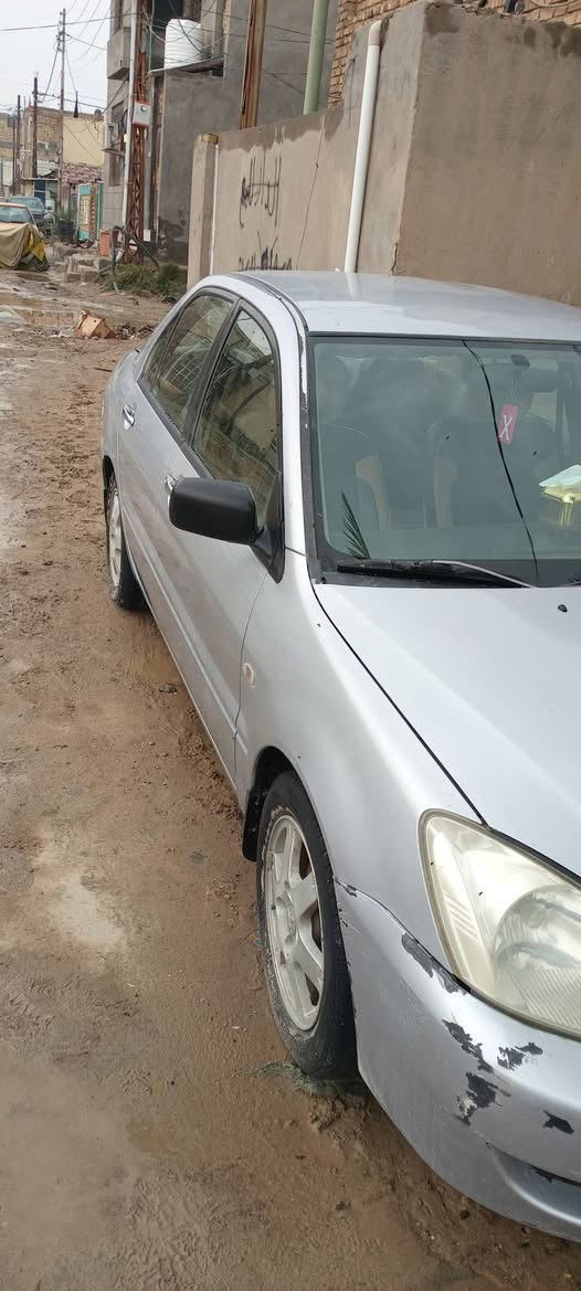 السلام عليكم 
لانسر مسيبوشي 2007قادسيه مصبوغة عام الجماليه  السعر65 مع المجال 
استفسار اتصال على الرقم(***********)
