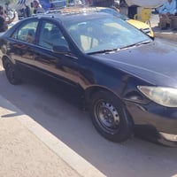أقره المنشور مراوس ب تكسي كامري موديل 2005 رقم بغداد انكليزي بسمي مصبو...