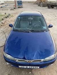 بروتون • ٢٠٠٤ • مكينة جديده