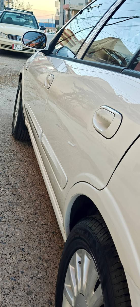 (نیسان سەنی کۆری گێڕ ئۆتۆماتیك)
• مۆدێل : ٢٠١٢
• ڕەنگ : سپی بەفریەو  مەکینەشی سپی مەغوبە
• بۆیاخ : بۆنید ، چەمەلەقی پێشەوە وپەڵەیەک چەمەلەقی دواوە
• کیلۆمەتری ڕۆیشتوو : ١٦١ هەزار 
• سەنەوی تا مانگی ٨ ی ٢٠٢٨ تازەیە وە بەناوی خۆمانەوەیە و بەشەرتی تەحویل
• گێڕ و مەکینە و تەبرید سارد و گەرم بە شەرت
• ویلکەپە و تایەی حەجمی ١٥ ی لەسەرە
• حاسەیە
• ٢ سویچی لەگەڵە و ناو زەردە و ٢ جام کارەبایە
• سەیارەکە زۆر پاك و جوان ماوەتەو ماڵی دۆستە
• نرخ : ١٠٧ گەڵا و معامەلەیەکی کەم
(برای ئازیزم گەر مشتەری نیت لەکاتی خۆت و ئێمەش مەگرە سوپاستەکەم)
(ژمارەی پەیوەندی : ***********) السليمانية, العراق
