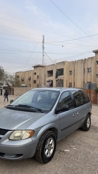 دوج كرفان 2006 لون ازرق شذري  السيارة بأسمي   تبريد شغال شرط ثلج تخم ت...