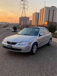 مازدا ٣٢٣ • مكينة ١٦٠٠ • أوتوماتيك