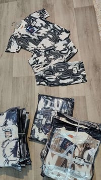 ملابس أطفال • ٨-١٤