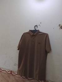 ملابس • توصيل