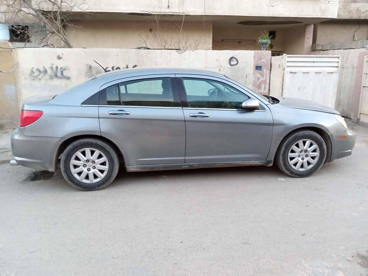 سياره كرايسلر C200  موديل 2009 رقم بغداد باسمي لون سلفر تحويل ثاني يوم السيارة جاهزة كير محرك كفاله باتري تخم تاير كله جديد تبريد ثلج حدادية السيارة مال جناي بيها جراد ما مصبوغه مكانها المحمودية سعرها ٦٥ وبيها مجال *********** بغداد, العراق
