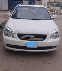 كيا اوبتما موديل ٢٠٠٧ وارد امريكي محرك ٦ سلندر /٢٧٠٠ سيارة كامل مواصفا...