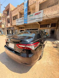 كامري هايبرد 2022  فئة xle تجي فول خمس كامرات داتا شو كشنات تدفئة تبري...