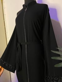 عبايات كويتي • فري سايز ١٠٠كج • سواد فاحم