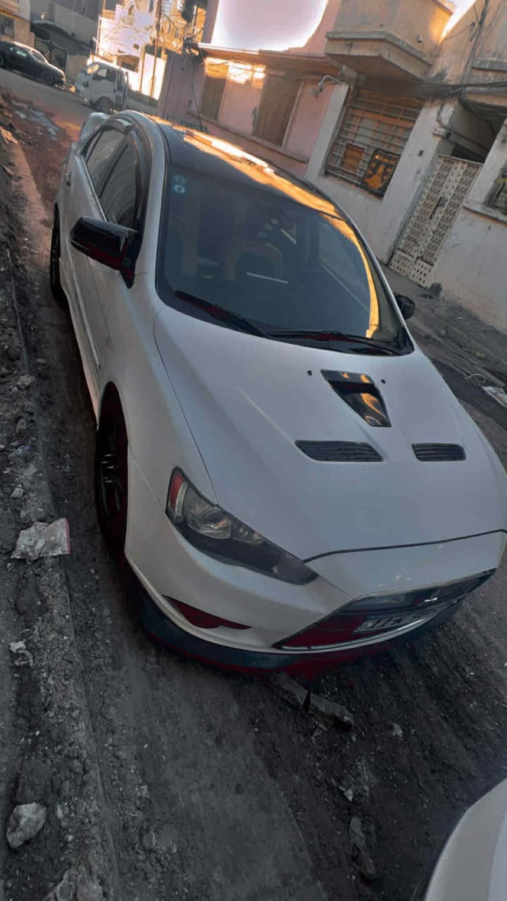 السلام عليكم 
لانسر خليجي GT 
موديل 2008
كير اوتماتيك
ماشيه 224 الف km
محرك كير تبريد كهربائيات مكفوله 
بدون اي تحوير بلفيش حته كلوب الجيك انجن مطفي
صيانه دوريه للسياره وكله اصلي 
صدر امامي خلفي 90% جديد 
منضومة تبريد جديده ثلج بعز الحر 
شفتات 
تحكم ستيرن جهتين 
سلايد 
بصمه 
كيجات ايفو 
شاشه اصليه اندرويد دايموند كار بلي 4K
كلشي بالسياره شغال 
شغل واطلع وين متحب بدون متخاف
بيه قطع صبغ وصورها قبل الصبغ موجوده و (سونار موجود)بدون ايرباك السياره وبدون حادث قوي 
كشرها حلو وصفاحها عدله ونصبتها كلش حلوه
لايت متحرك مع فره الستيرن وشغال 
سستم صوت دمام بلادي 
ويل اصلي ريسي 
تخم تاير ايطالي بيرلي 
و وياها تخم ويل كب وتايرات اضافيه غير المشدوده بيها
وايضا قاعده فيت بم احتياط جديده بالكارتون
وجويتر اضافي تفصيخ شغال ١٠٠٪؜
رقم انكليزي جديد + سنوية باسمي شخصياً
عليه اضافات بسيطه للجمالية
سعر السياره 90 ورقه نقد فقط بدون مرارس وبيها مجال جدا بسيط
العنوان بغداد الخطيب 
*********** بغداد, العراق
