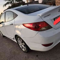 اكسنت • ٢٠١٤ • رقم أربيل