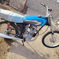 دراجة نارية • شاصي ومكينة • مكاني كحلائ