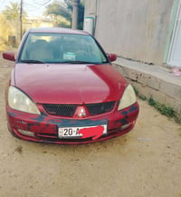 لانسر • 2010 • دلي عباس