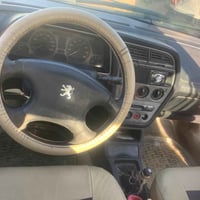 بيجو ٣٠٦ • بغداد