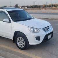 شيري تيكو 2014كير ميكانيكي سيارة بيهة باب السائق مبدل والجاملغ الامامي...