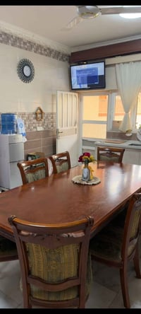 ميز طعام • خشب زان • بصره الامل