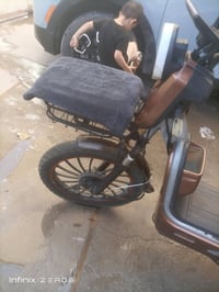 دراجة شحن • جديدة • بطارية وعقل خربان
