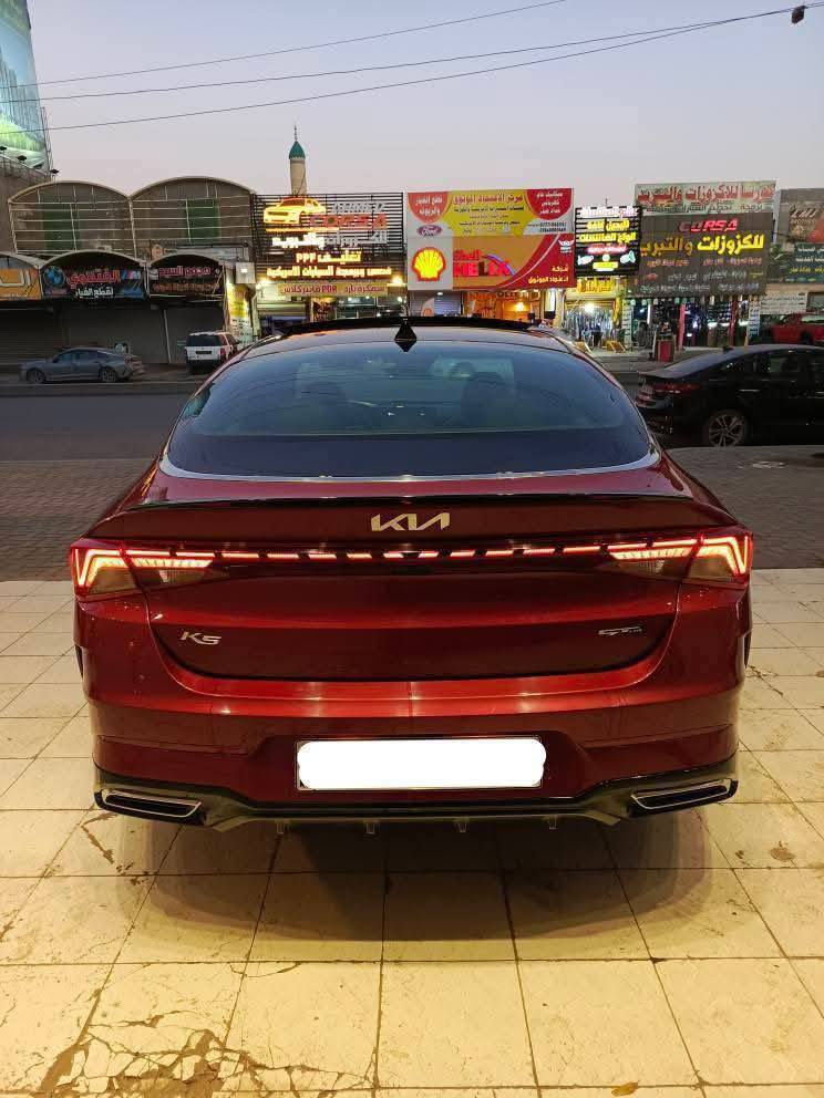 كيا كي فايف جيتي لاين / KIA K5  GT LAIN
موديل 2022 #السعر 167 ورقة وبيها مجال

لون ماروني / مدخلها حمام وبوليش عام

محرك 1600 تيربو المرغوب / رقم اربيل الانكليزي 

بأسمي / تحويل أو وكالة حاضر / سنوية 2029

حجر البيئة موجود بيها / الأرضيات الأصلية موجود
ــــــــــــــــــــــــــــــــــــــــــــــــــــــــــــــــــــــــــــــــــــــــ
فول مواصفات السيارة Gt lain 

بانوراما / بصمة تشغيل / بصمة ابواب وصندوك / اوتو هولد 

تشغيل عن بعد / رادارات جانبية / مانع تصادم / بك لايت لد 

كامرة خلفية / كشنات جلد / هاند بريك بصمة / تحديد مسار  

تحكم استيرن جهتين / شاشة اصلية / لد امامي / دركة D

مانع انزلاق / كرسي كهرباء / درايف مود / لايت 4 عدسات 

ويل كب كروم / تبريد منفصل / شاحن واير ليس / زينون

صندوك ذكي عند الاقتراب / اشاير بالمري / قيادة ذاتية 

ويل كب حجم 18 / مري اسود / كشنات ختم GT LINE 
ـــــــــــــــــــــــــــــــــــــــــــــــــــــــــــــــــــــــــــــــــــــــــ
صور الحادث مرفقة بالمنشور
وراشين بيها صبغ بدبي أثناء التصليح توحيد لون

#السعر 16,700 الف دولار وبيها مجال 

مكان السيارة / بغداد / حي الجامعة 

للاستفسار 
*********** متوفر واتساب او اتصال
