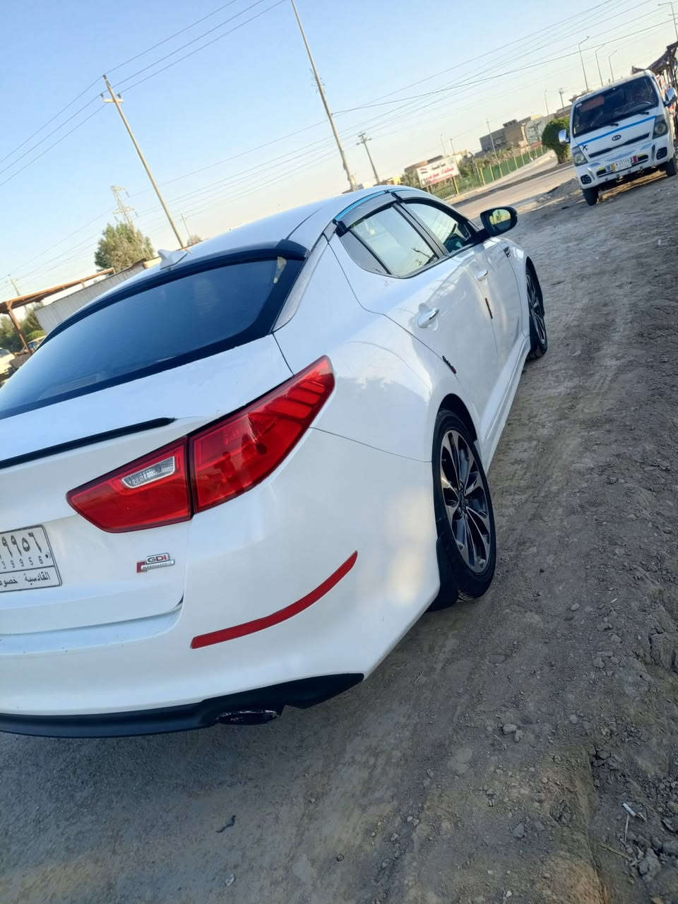 سلام عليكم اوبتيما موديل 2014امريكي ضربته شبر بجاملغ موضح بصوره لباقي كفاله عامه مكينه كير حداديه تخم تاير ترايك وين ماتريد رقم قادسيا  الرقم ***********
