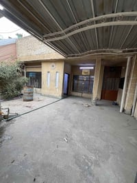 بيت مساحه 200 متر طابو صرف ابو دشير شارع الضغط قرب اسواق بيت جدو طابقي...