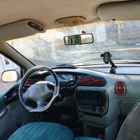 سياره دوج كرفان 7راكب للبيع  السعر 50 للاتصال 07738434034 07838354408