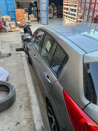 نيسان فيرسا ٢٠٠٩ بأسمي رقم بغداد سياره جاهزه كير ومحرك وتبريد ممتاز بي...