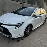 للبيع كورلا هايبرد وارد الصين الشكل الامريكي كشن مخمل وبقية المواصفات ...