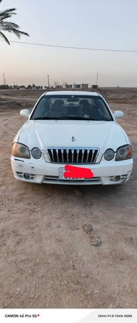 كيا اوبتيما • ٢٠٠٤ • رقم بغداد