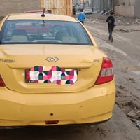 شيري E5 موديل 2014 محور كورله 1800 محرك الحديث  رقم بغداد باسمي بيه من...