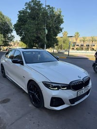 Bmw .330e هايبرد بلكن مكينه 2000 تون بور تيربو  اسرع من عاديه ب50 حصان...