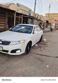 كيا اوبتيما موديل ٩   سياره جاهزه كير مكينه مكفولات   حداديه  كارتون ت...