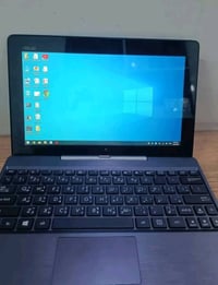 لابتوب اسوز • قابل للتحول • ٦٤GB SSD