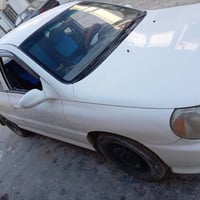كيا ريو • ٢٠٠٠ • رقم صلاح الدين