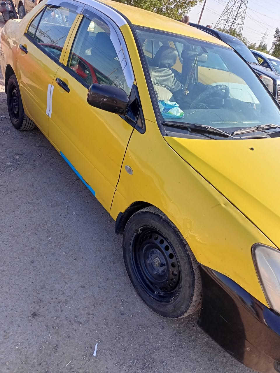 لانسر صفرة تكسي موديل 2010محرك 2000حاوية كير حاوية تبريد ثلج باتري جديد تخم تاير جديد سنوية بسمي رقم ديالى سنوية جديدة لل2031عنواني ديالى بعقوبة الرحمه الرقم ***********
