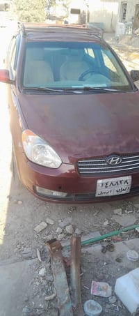 اكسنت موديل ٢٠١٠ بيها جاملغ خلفي مثل ما موضح بلصورة السعر ٧٠ مكانها بغ...