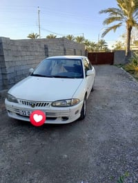 بروتون ٢٠٠٤ • رقم بغداد • باسمي