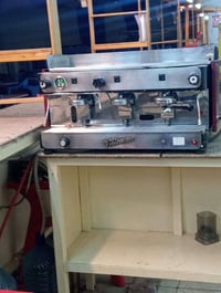 جهاز اسبريسو إيطالي اصلي  سعره 11 ورقة  بغداد سبع ابكار  07705145081