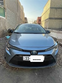 كورلا هايبرد 2022 وارد امريكي   ماشيه 49 الف  رقم بغداد  حادثه تبديل ب...