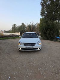 اوبتيما • ٢٠٠٨ • مكينة 2000