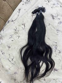 شعر طبيعي • ٥٧ سم • ١٠٠ خصلة