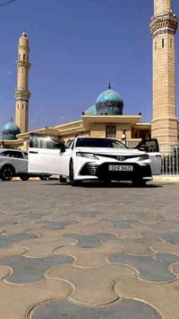 كامري دبي 2023 معلايه خليجي ماشيه 97الف رقم بغداد بإسمي بدون ضرر صبغ ف...