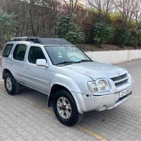 اكستيرا • ٢٠٠٣ • دبل اكسل