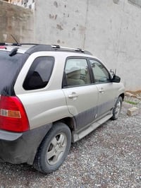 سبورتج ٢٠٠٨ • ماشي ١٥٠٠٠٠ • ماكينة وكير شركة