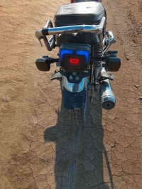 دراجة موديل 25 • أوراق كرتونية • ديالى الخالص