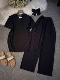 ⁨	تراك اسود 🖤 السعر 6 القياسات فري  38-40-42-44 للحجز    07710111128  ...