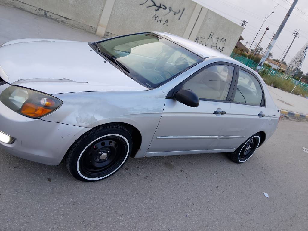 كيا سيراتو خليجي 2007 محرك 1600 مكينه كير حداديه تخم تاير سنويه جديده رقم انكليزي باسمي للبيع او للمراوس مكفولة من الضربه القوية بيه جراد والسلفر كله يجرد مكان السياره قضاء الشطره السعر 84 ولشراي بيه مجال *********** الشطره, ذي قار
