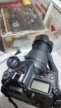 نيكون D7100 • شتر ١٠٠٠٠ • عدسة أصلية